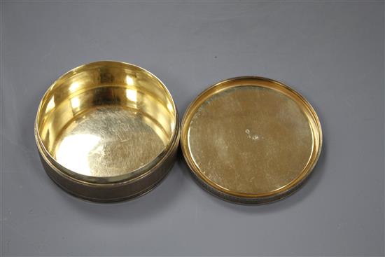 A late 19th/early 20th century French engine turned 950 standard white metal circular box and cover,